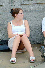 Voyeured on the street - up skirt milf